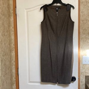 Worth dress. Brown with brown leather on the straps.